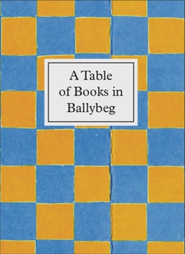 A Table of Books in Ballybeg - Simon Cuts - Erica Van Horn