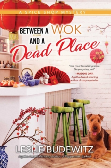 Between A Wok And A Dead Place - Leslie Budewitz